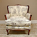 old upholstered armchair